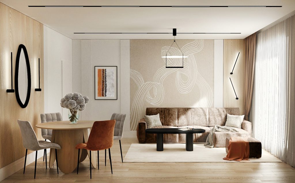 În acest living room cu zonă pentru servit masa am îmbinat elemente minimaliste în tonuri calde alături de materiale confortabile. Piesele cu colțuri rotunjite și forme atipice alături de grafica tapetului, care schițează o panglică în bătaia vântului, sunt elemente ce aduc natura în spațiul amenajat.